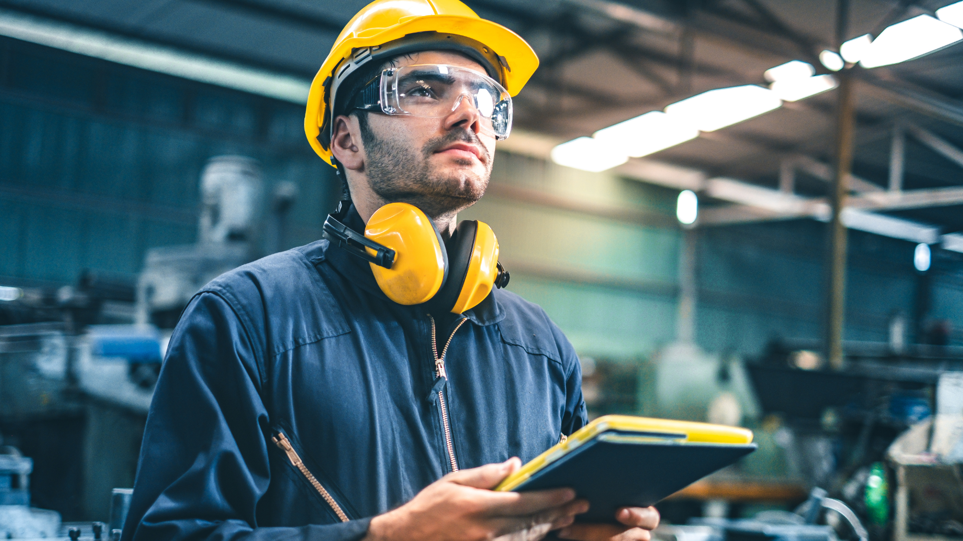 Industrial engineer using AI to monitor sensor data across manufacturing systems